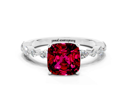 White gold Cushion Cut Garnet Solitaire with Side Stones on a Pavé Band and Four-Prong Setting
