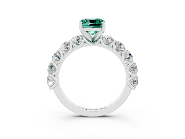 Platinum Cushion Cut Green Sapphire Prong Setting with Side Stones on a Pave Band