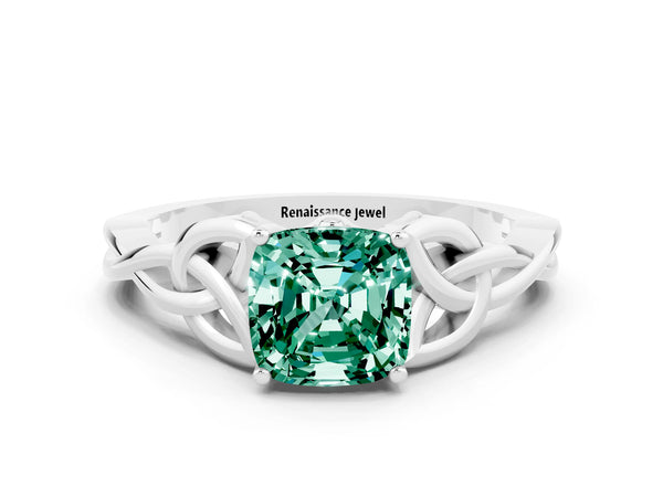 Platinum Cushion Cut Green Sapphire Solitaire Engagement Ring with Celtic Knot Band and Four-Prong Setting