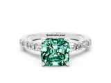 White gold Cushion Cut Green Sapphire Solitaire with Side Baguettes and Channel Set Band