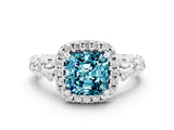 White gold Cushion Cut Halo Diamond Solitaire with Filigree Band and Four-Prong Setting