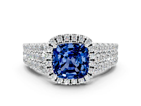 White gold Cushion Cut Blue Sapphire Halo Engagement Ring with Triple Row Round Pavé Band and Prong Setting