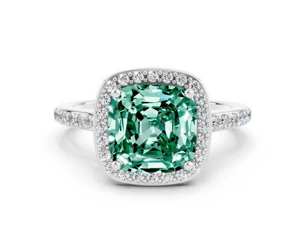 Platinum Cushion Cut Green Sapphire Halo Engagement Ring with Round Pavé Shoulders and Prong Setting