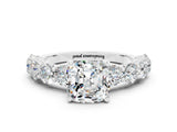 White gold Cushion Cut Moissanite Prong Setting with Side Stones on a Pave Band