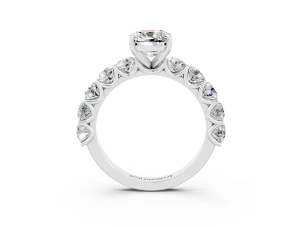 Silver Cushion Cut Moissanite Prong Setting with Side Stones on a Pave Band