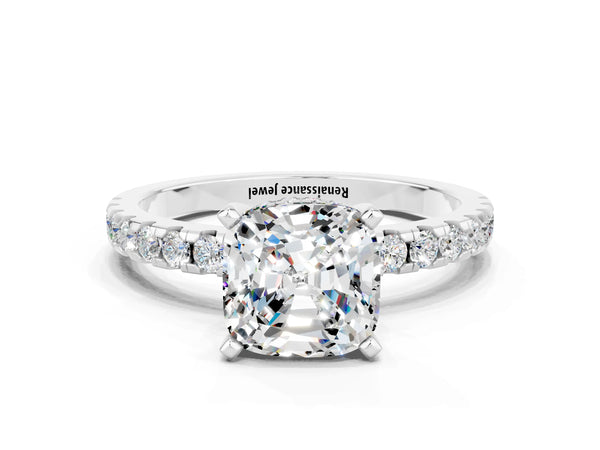 Platinum Cushion Cut Moissanite Solitaire Ring with Round  Pavé Band and Four-Prong Setting