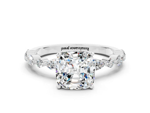 White gold Cushion Cut Moissanite Solitaire with Side Stones on a Pavé Band and Four-Prong Setting
