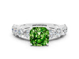 White gold Cushion Cut Peridot Prong Setting with Side Stones on a Pave Band