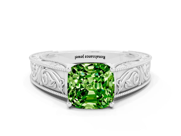 Platinum Cushion Cut Peridot Solitaire Ring with Engraved Band and Four-Prong Setting