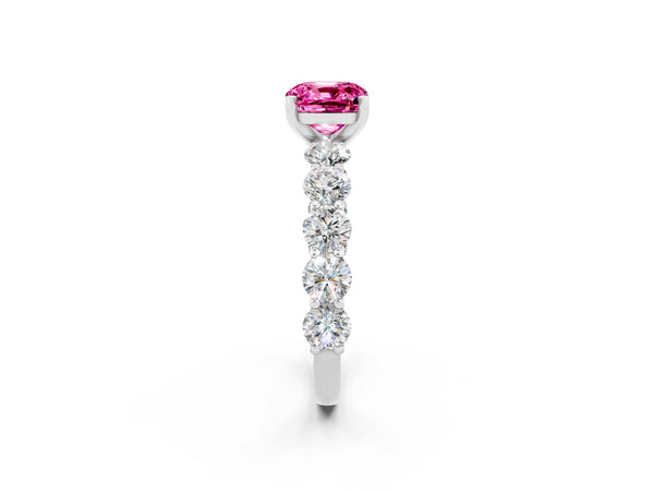 White gold Cushion Cut Pink Sapphire Prong Setting with Side Stones on a Pave Band