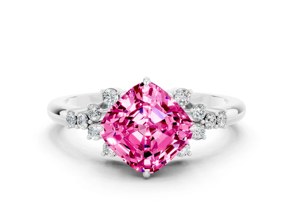 Platinum Cushion Cut Pink Sapphire Ring with Side Stones and Four-Prong Setting