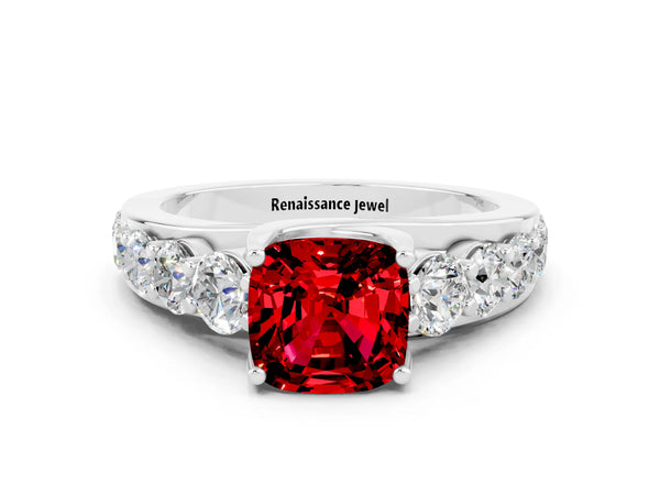 Platinum Cushion Cut Ruby Engagement Ring with Pavé Band and Four-Prong Setting