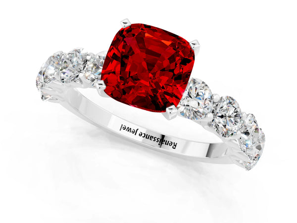 White gold Cushion Cut Ruby Prong Setting with Side Stones on a Pave Band