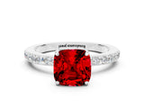 White gold Cushion Cut Ruby Solitaire Engagement Ring with Pavé Band and Four-Prong Setting