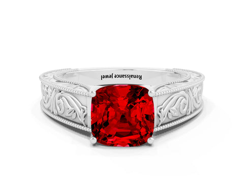 White gold Cushion Cut Ruby Solitaire Ring with Engraved Band and Four-Prong Setting