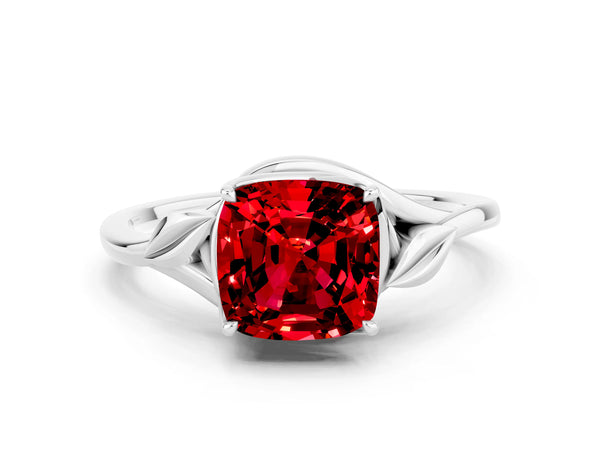 Platinum Cushion Cut Ruby Solitaire Ring with Twist Band and Four-Prong Setting