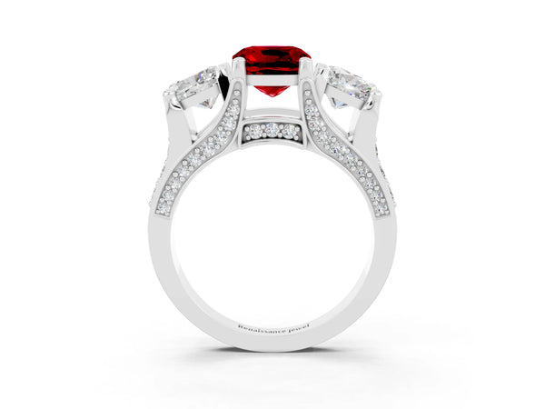 White gold Cushion Cut Ruby Three-Stone Ring with Channel Set Band and Four-Prong Setting
