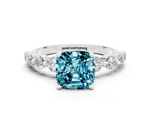White gold Cushion Cut Solitaire Blue Topaz Ring with Pave Band and Four-Prong Setting