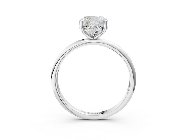 White gold Cushion Cut Solitaire Engagement Ring with Four-Prong Setting and Classic Band