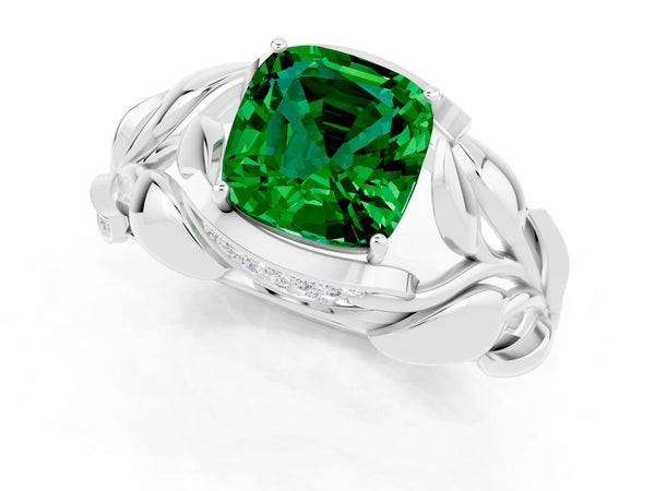 Platinum Cushion Cut Emerald Leaf-Inspired Engagement Ring with Round Accents and Prong Setting