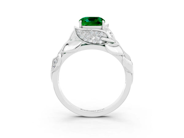 Silver Cushion Cut Emerald Leaf-Inspired Engagement Ring with Round Accents and Prong Setting