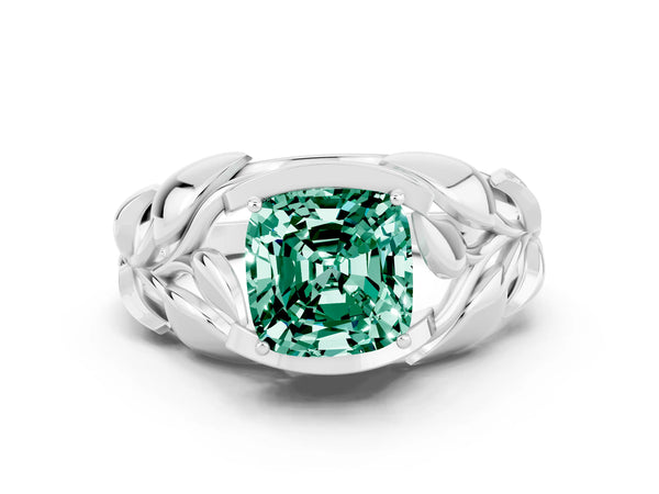 Platinum Cushion Cut Green Sapphire Leaf-Inspired Engagement Ring with Round Accents and Prong Setting