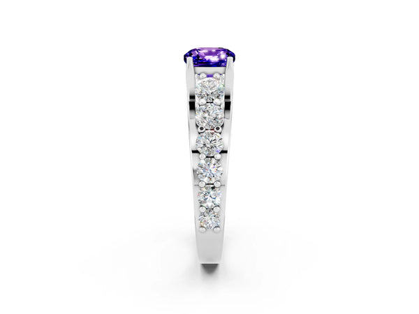 Platinum Cushion Cut Tanzanite Engagement Ring with Pavé Band and Four-Prong Setting
