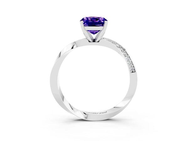 Silver Cushion Cut Tanzanite Engagement Ring with Side Stone Accents and Four-Prong Setting