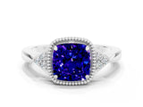 White gold Cushion Cut Tanzanite Halo Ring with Tapered Band and Four-Prong Setting