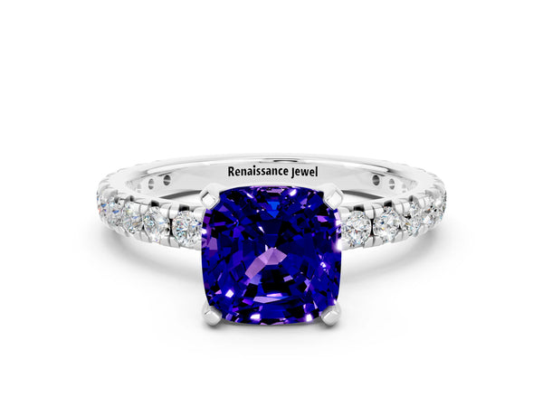Platinum Cushion Cut Tanzanite Pavé Solitaire Ring with Round Band and Prong Setting