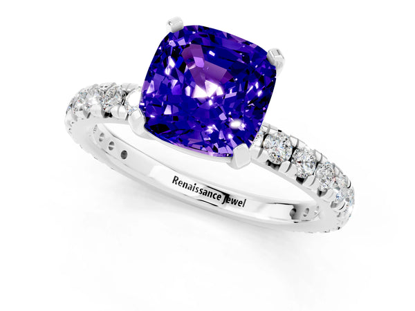 Platinum Cushion Cut Tanzanite Pavé Solitaire Ring with Round Band and Prong Setting