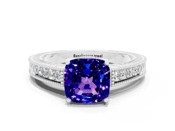 Platinum Cushion Cut Tanzanite Ring with Milgrain Pavé Band and Four-Prong Setting