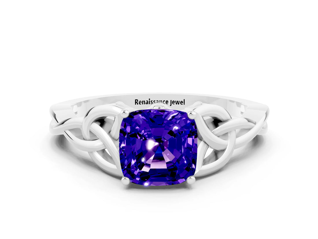 White gold Cushion Cut Tanzanite Solitaire Engagement Ring with Celtic Knot Band and Four-Prong Setting