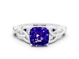 White gold Cushion Cut Tanzanite Solitaire Engagement Ring with Celtic Knot Band and Four-Prong Setting