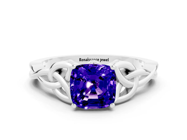 White gold Cushion Cut Tanzanite Solitaire Engagement Ring with Celtic Knot Band and Four-Prong Setting