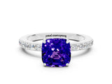 White gold Cushion Cut Tanzanite Solitaire Engagement Ring with Pavé Band and Four-Prong Setting