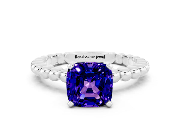 White gold Cushion Cut Tanzanite Solitaire Ring with Beaded Band and Prong Setting