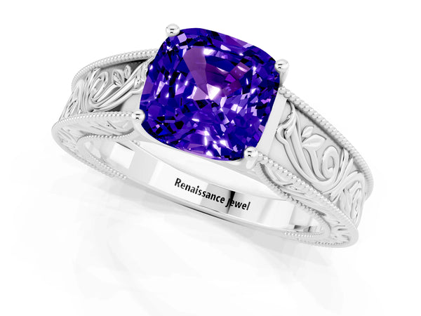 Silver Cushion Cut Tanzanite Solitaire Ring with Engraved Band and Four-Prong Setting