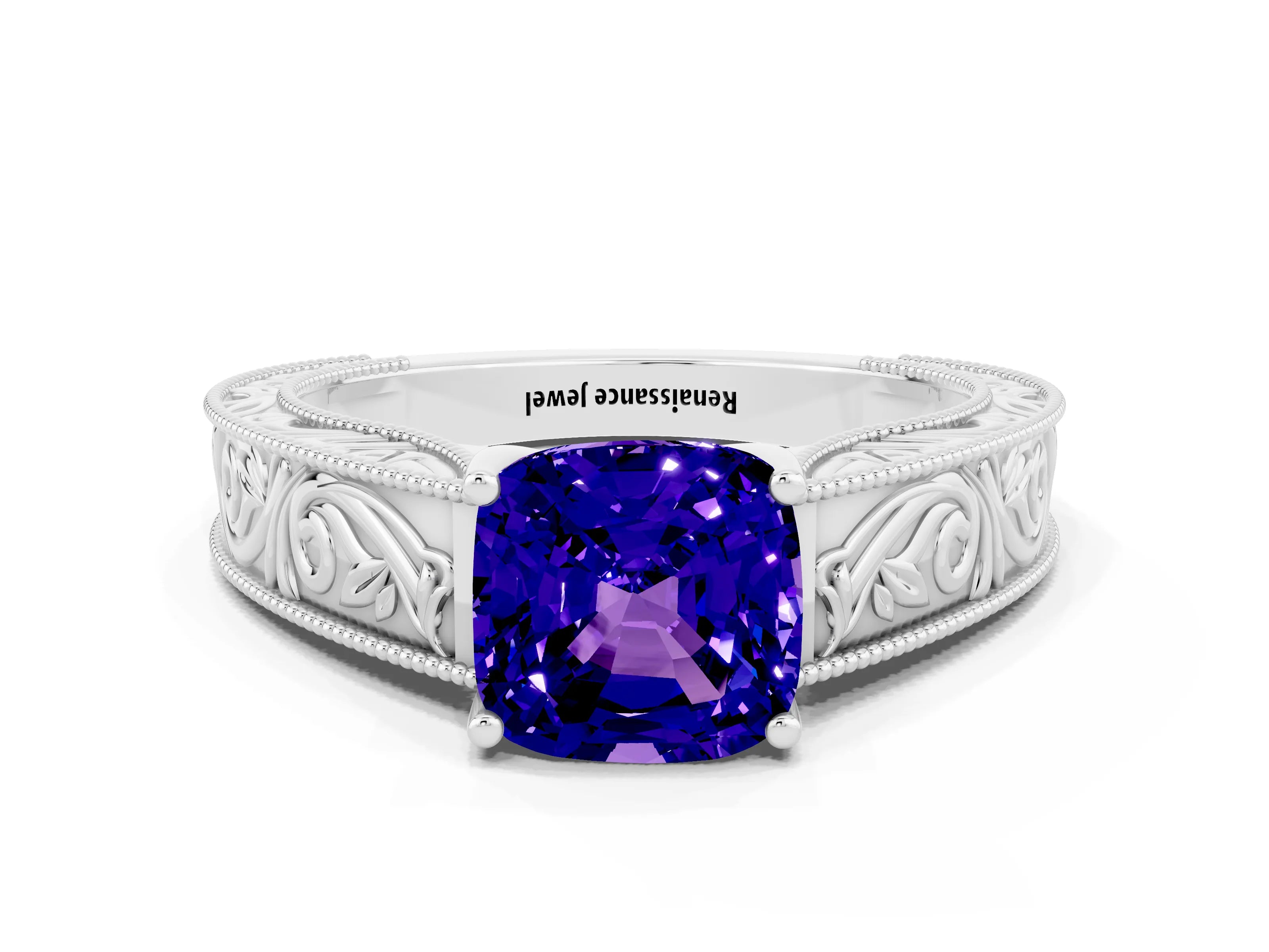 White gold Cushion Cut Tanzanite Solitaire Ring with Engraved Band and Four-Prong Setting