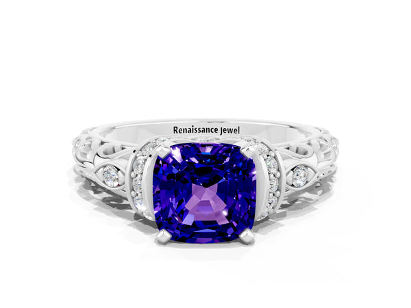 White gold Cushion Cut Tanzanite Solitaire Ring with Filigree Band and Four-Prong Setting