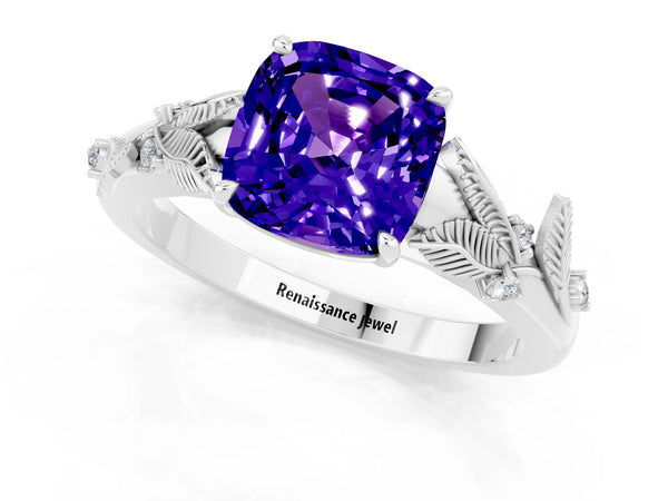Platinum Cushion Cut Tanzanite Solitaire Ring with Leaf Motif Band and Four-Prong Setting