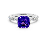 White gold Cushion Cut Tanzanite Solitaire Ring with Pavé Accents and Four-Prong Setting