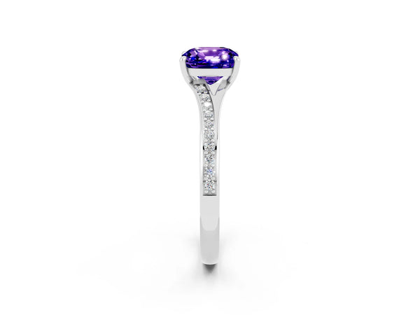 Platinum Cushion Cut Tanzanite Solitaire Ring with Pavé Band and Prong Setting