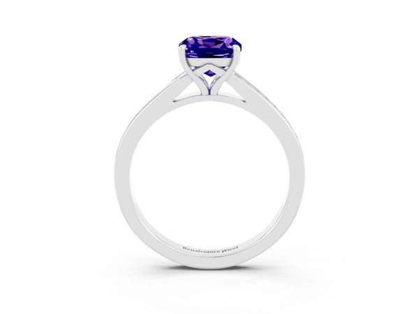 Platinum Cushion Cut Tanzanite Solitaire Ring with Pavé Band and Prong Setting
