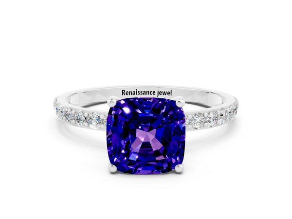 Platinum Cushion Cut Tanzanite Solitaire Ring with Round  Pavé Band and Prong Setting