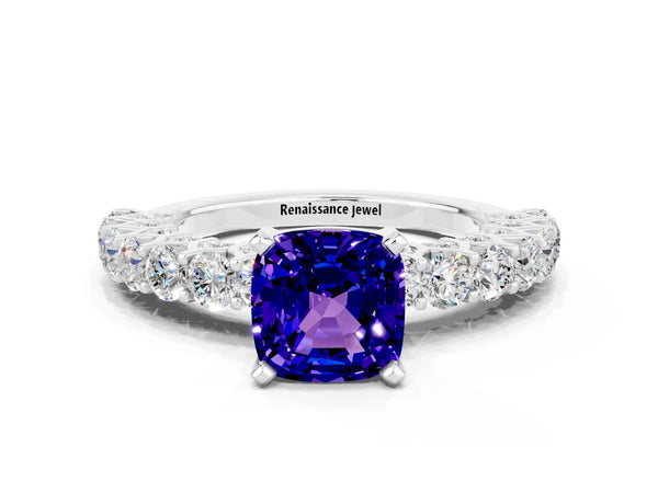 Silver Cushion Cut Tanzanite Solitaire Ring with Shared Prong Pavé Band and Four-Prong Setting