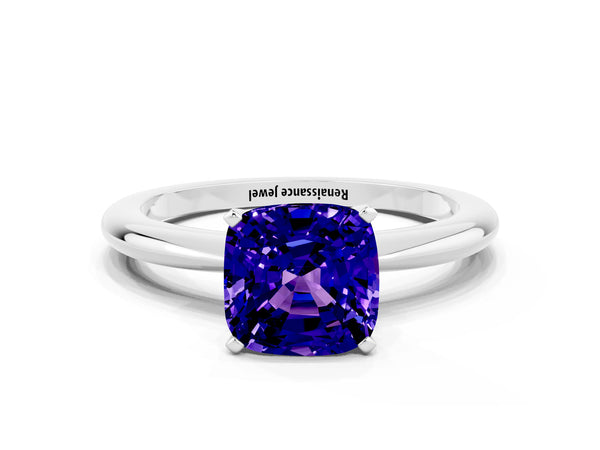 Platinum Cushion Cut Tanzanite Solitaire Ring with Six-Prong Setting and Classic Band