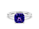 White gold Cushion Cut Tanzanite Solitaire Ring with Thin Band and Four-Prong Setting