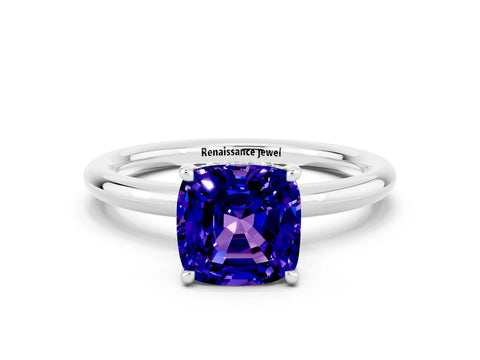 White gold Cushion Cut Tanzanite Solitaire Ring with Thin Band and Four-Prong Setting