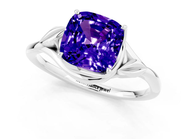 Platinum Cushion Cut Tanzanite Solitaire Ring with Twist Band and Four-Prong Setting